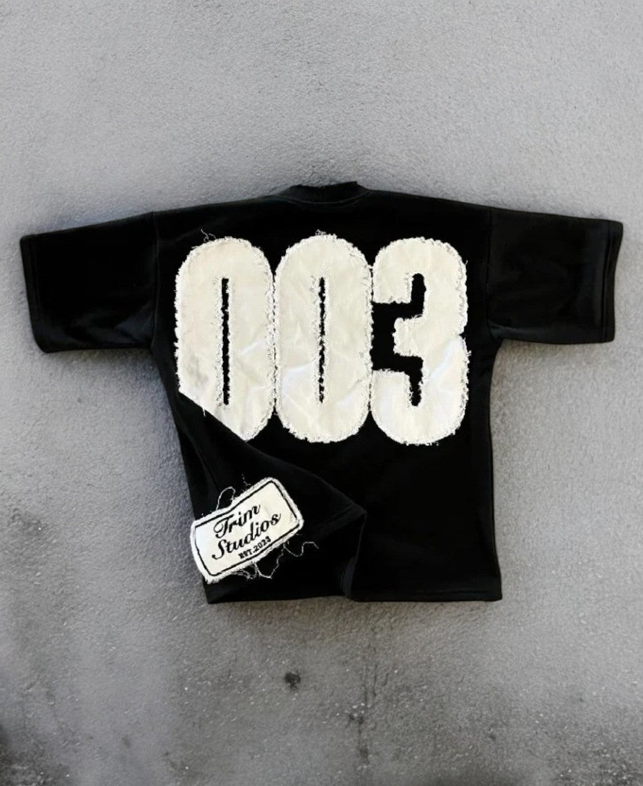 003 Trim Studios Tee