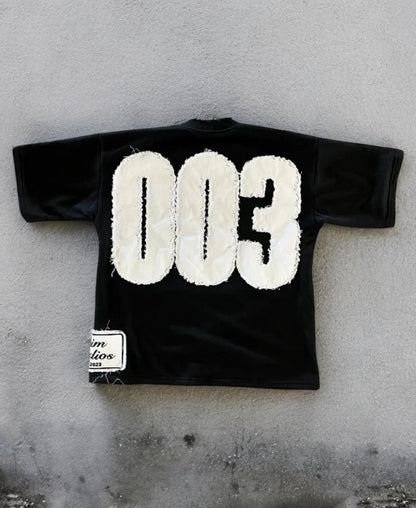 003 Trim Studios Tee